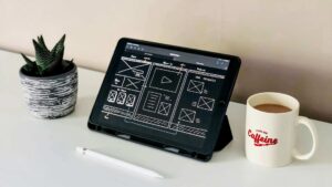 An example of how a planned wireframe looks like using a portable tablet and a pen